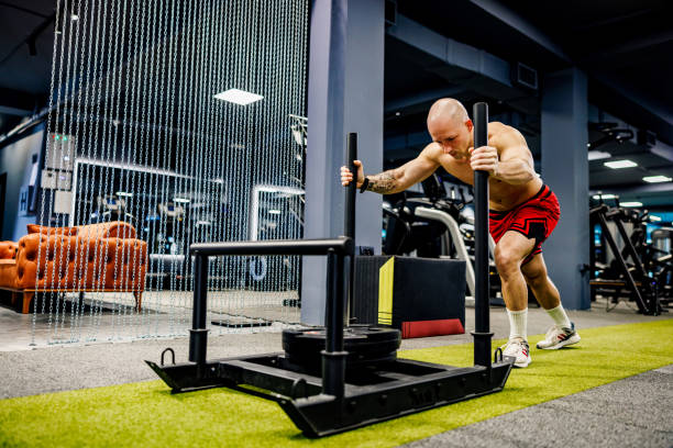Athlete performing strength exercises tailored by blood-based fitness training
