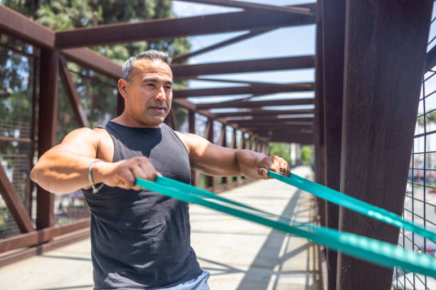Athlete using resistance bands in a longevity training routine for men