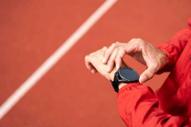 Close-up of smartwatch displaying real-time tracking during exercise