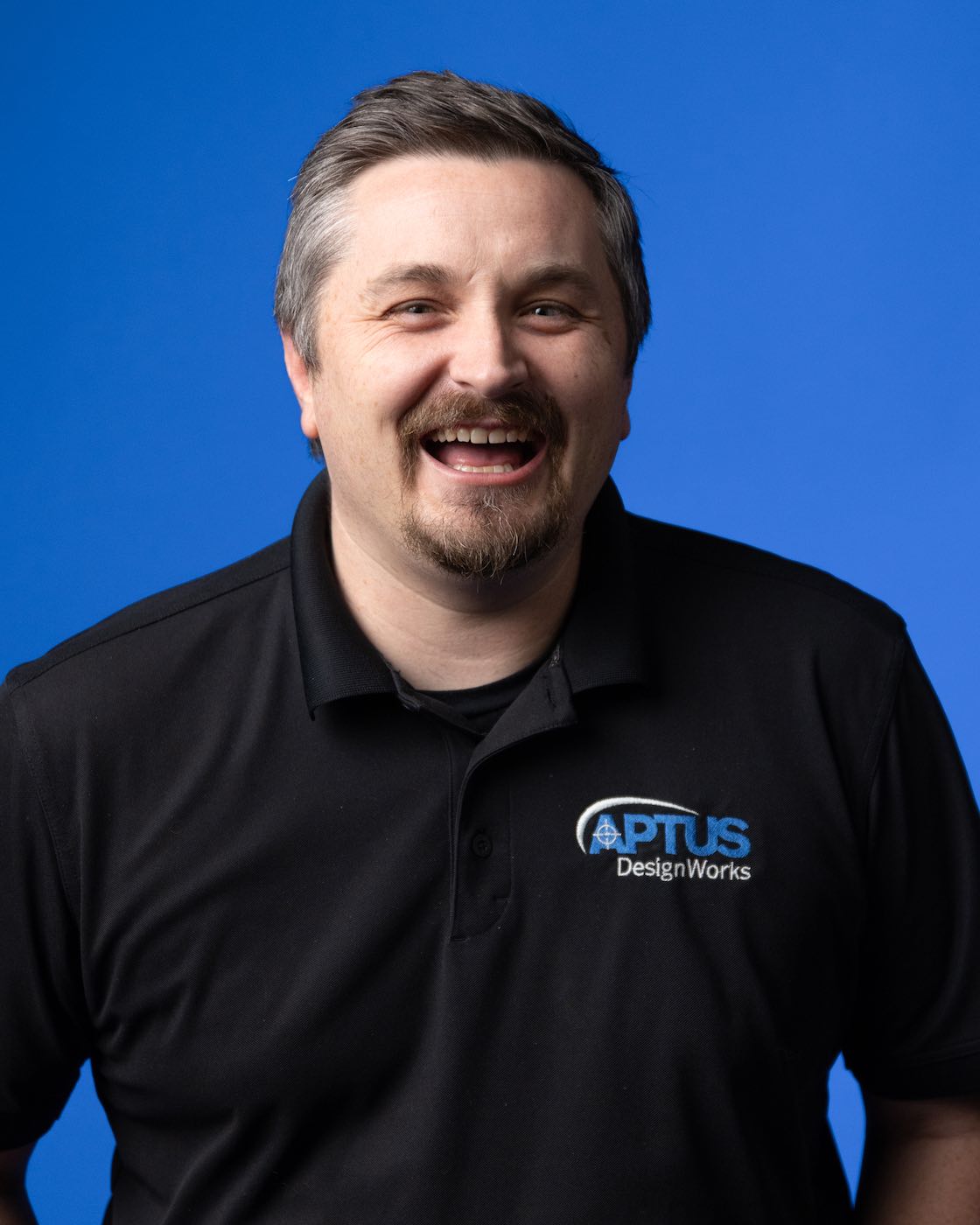 a photograph of an APTUS team member
