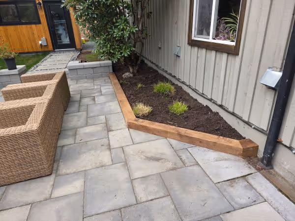 photo of a garden bed edged by 6x6 wood planks