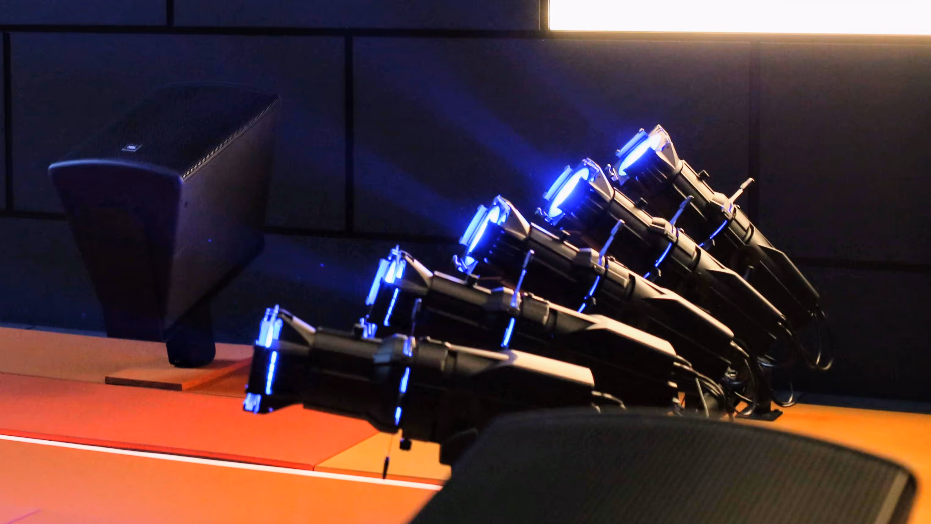Conference microphones with LED indicators in corporate boardroom