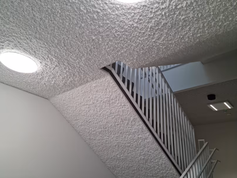 acousticly treated ceiling in hallway