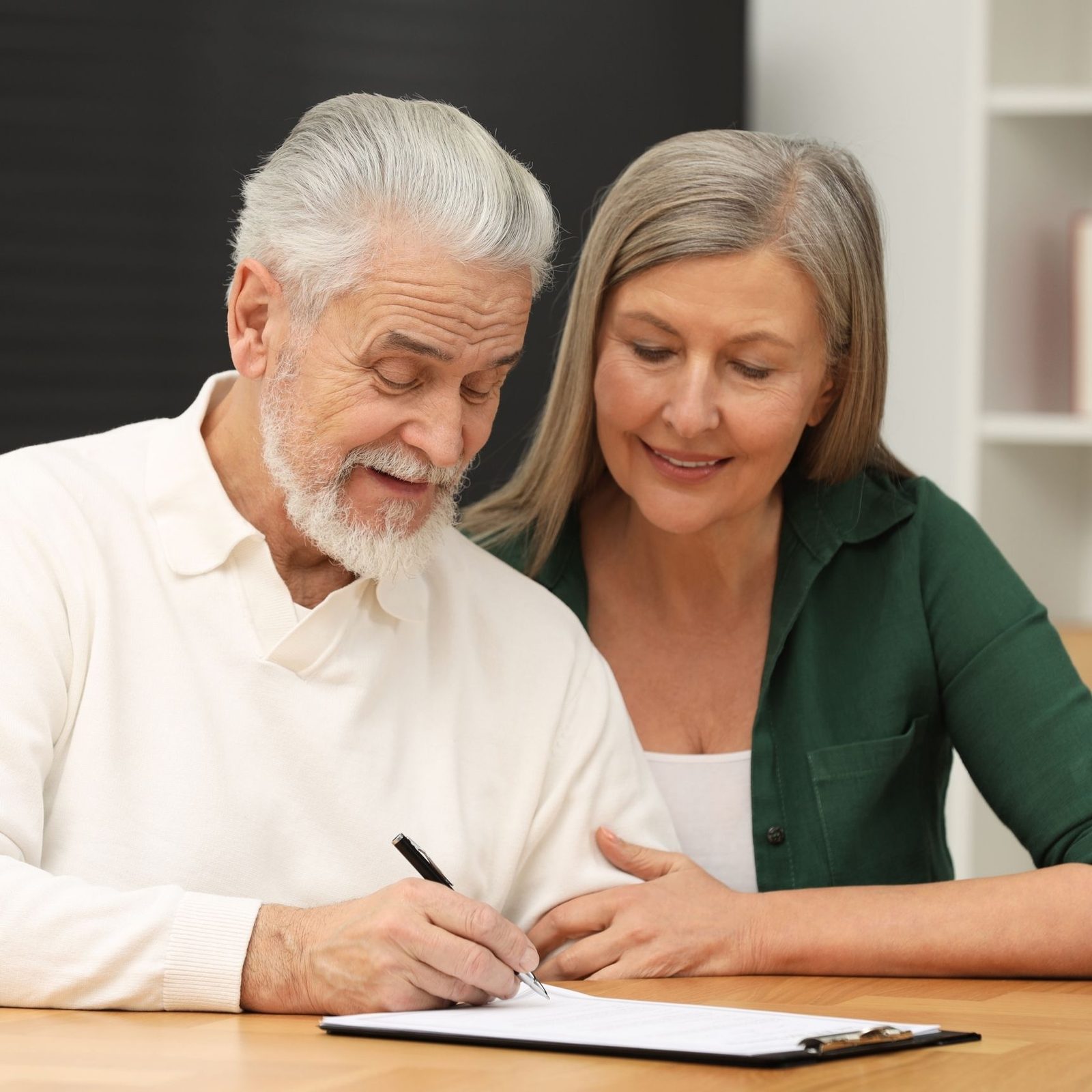 Probate attorney in Oceanside, CA reviewing estate documents with client