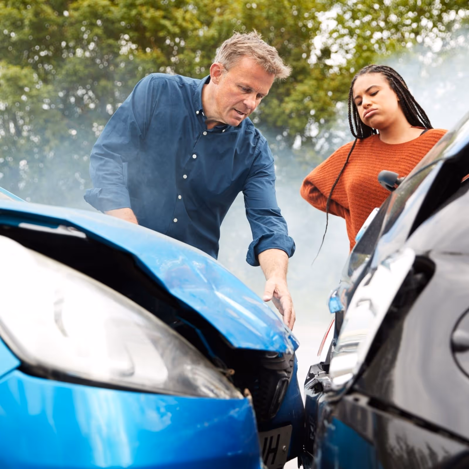 Phoenix car accident attorney discussing case with injured client in law office