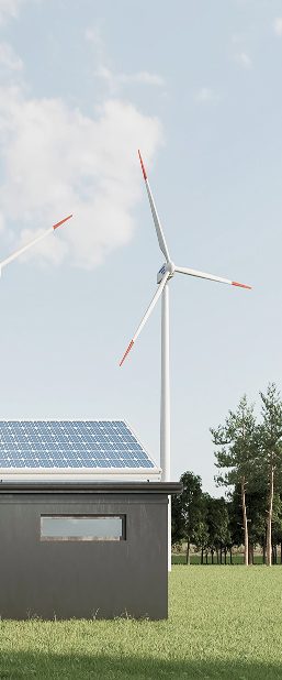 A building with solar panels and a wind turbine.