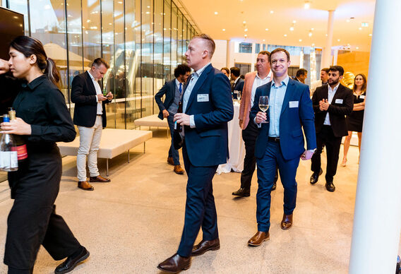 Guests arriving with drinks before the evening begins