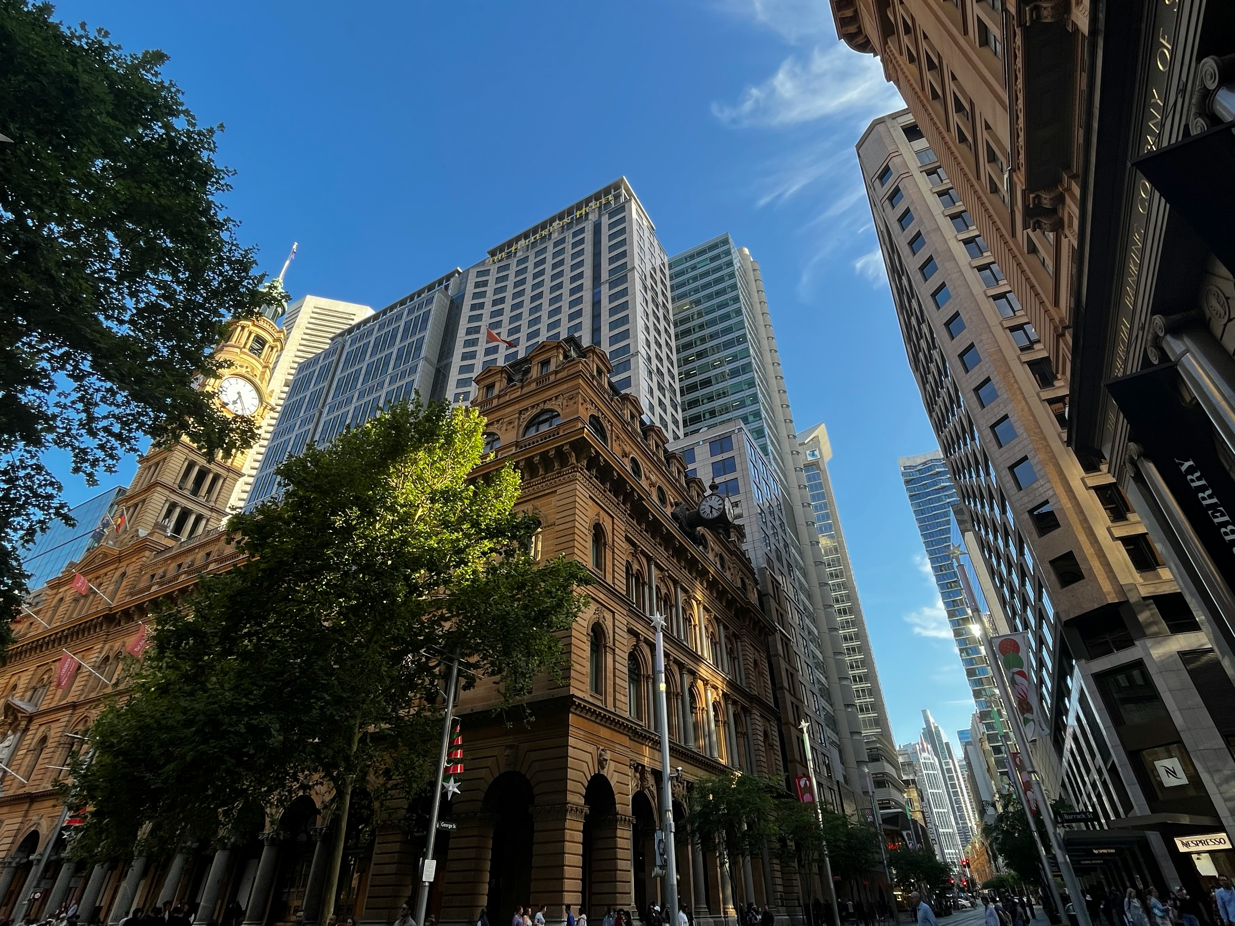 A city street with tall buildings