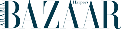 A black and blue logo with the words bazzar on it.