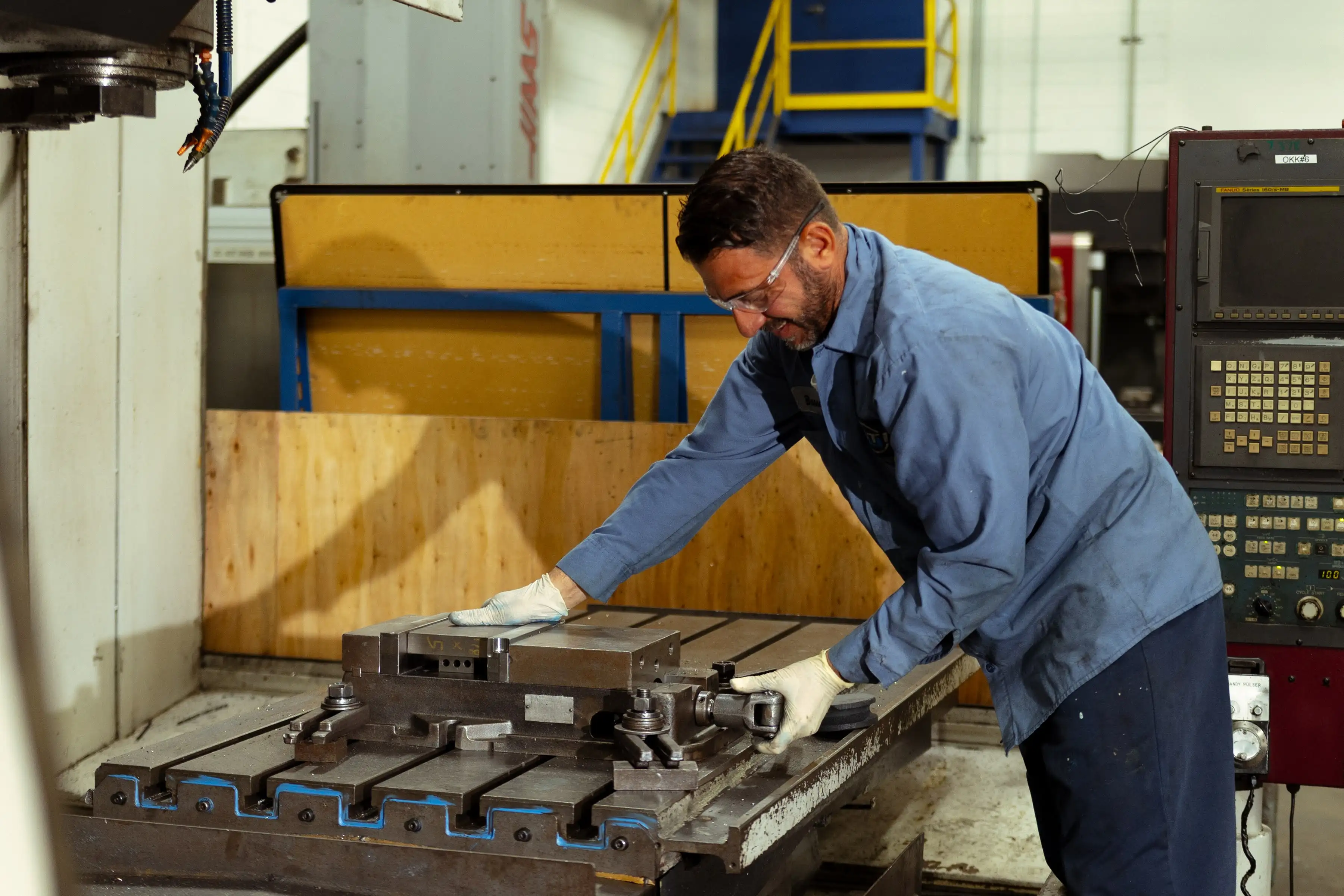 A DTI Engineer working in one of the tooling facilities.