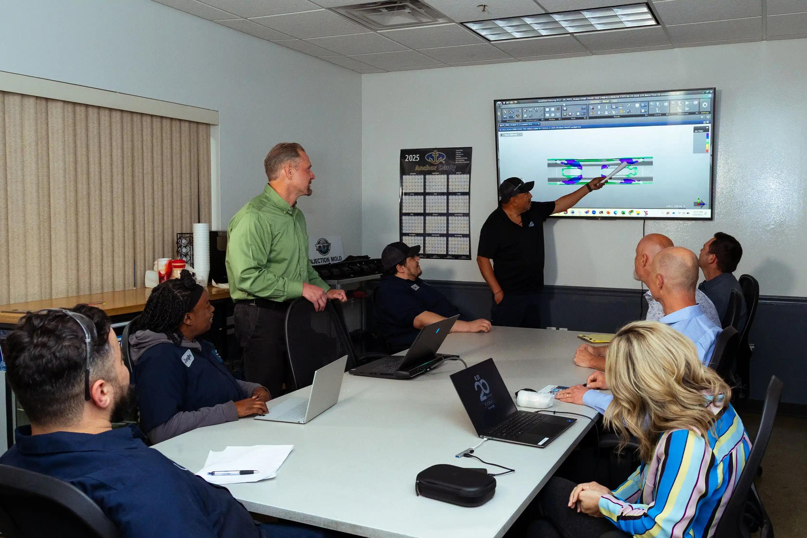 Cross section of a meeting ongoing at the DTI office. 