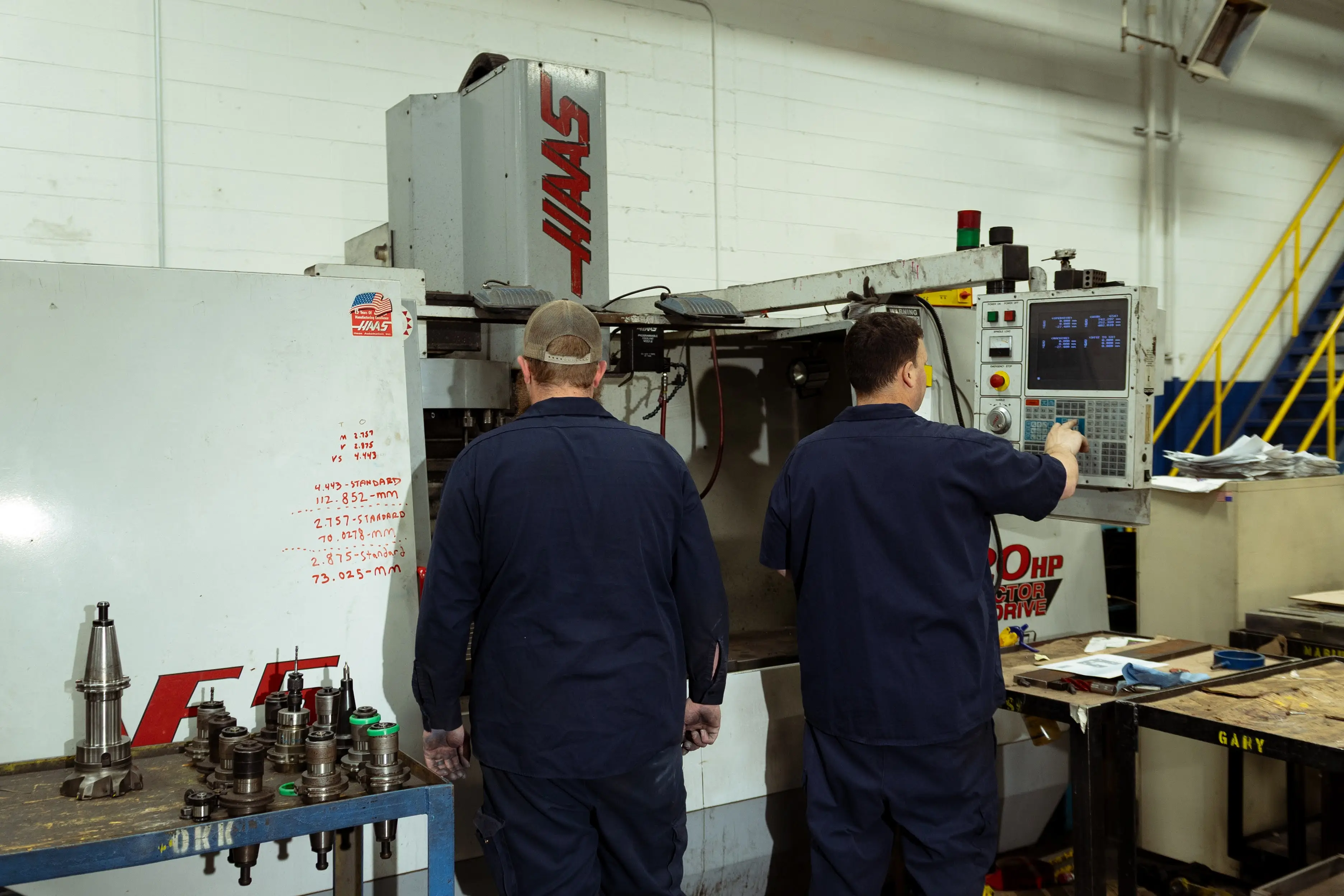 Two DTI Engineer working in one of the facilities. 