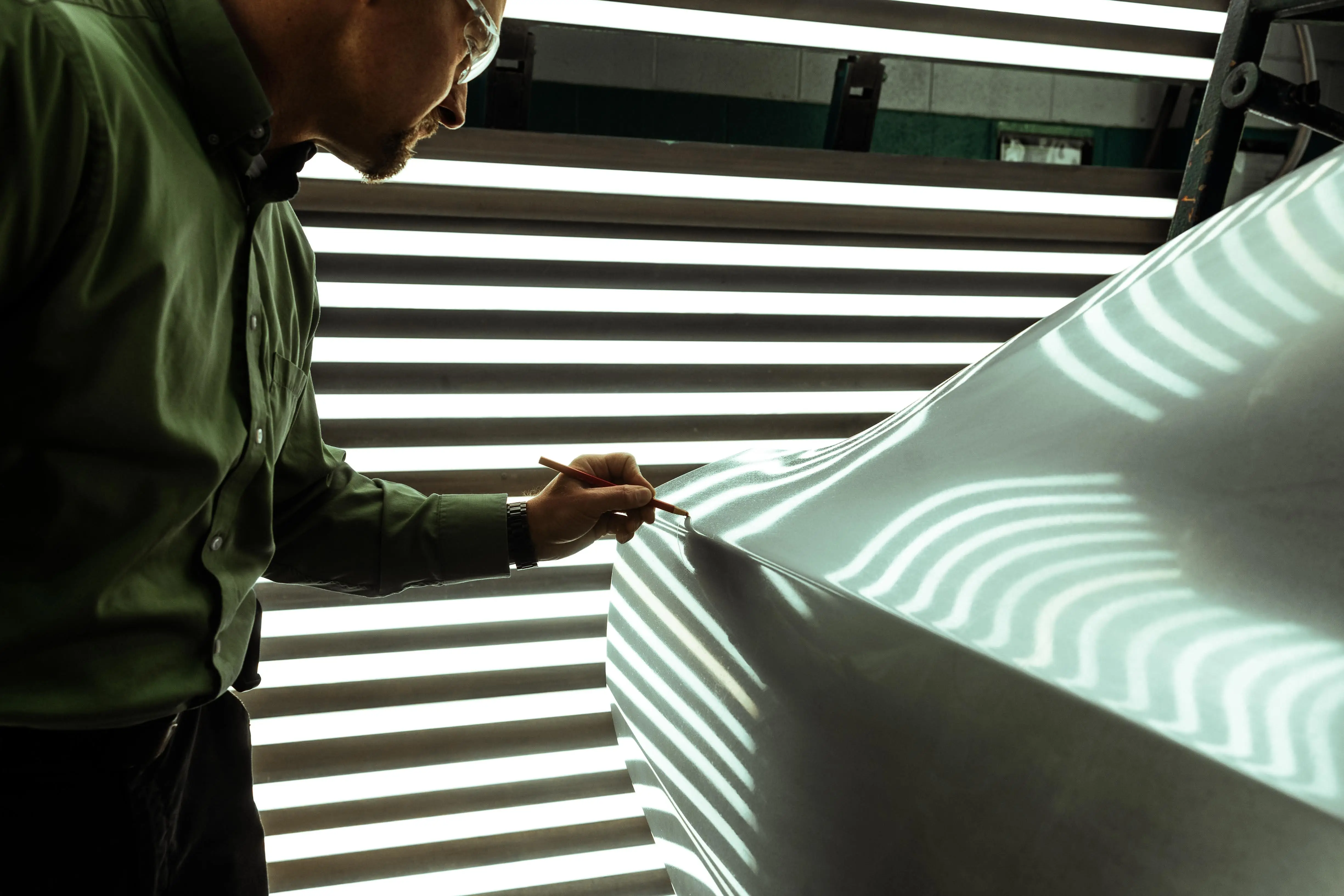 An Engineer tuning the body of an automotive, representing DTI tuning local service.