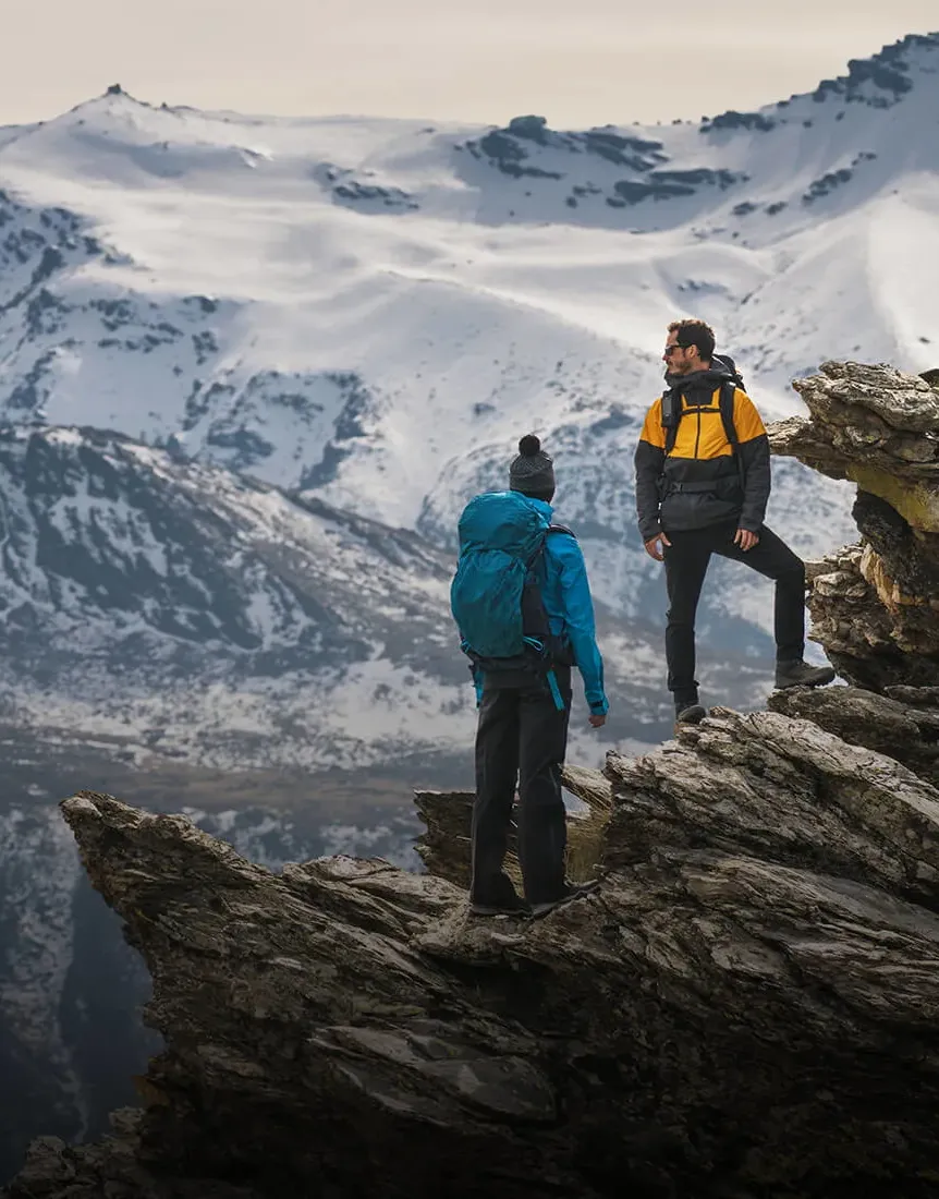Two people on a mountain.