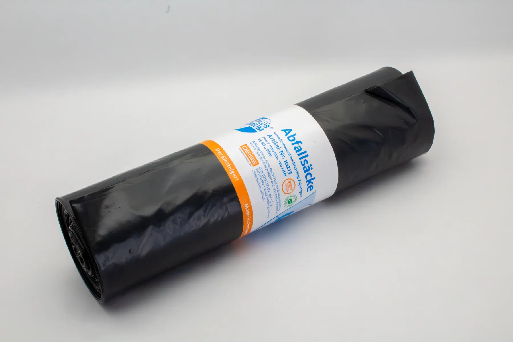 Blue and orange custom printed easy open paper banderole wrapped around a roll of black garbage bags.