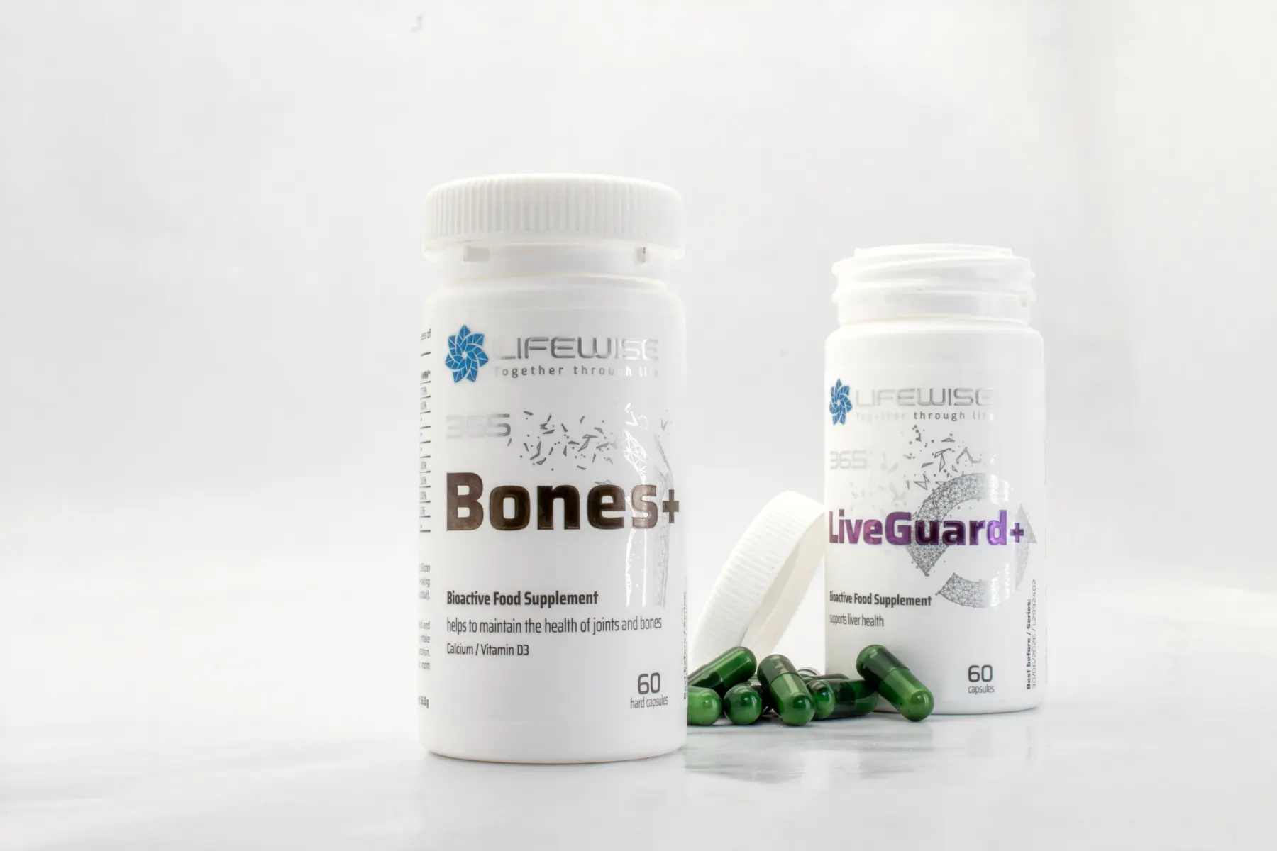 Custom printed self-adhesive labels for food supplement bottles featuring clean and professional branding.