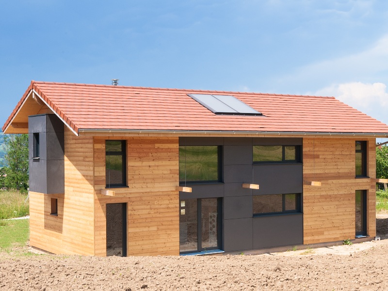 Maison en bois neuve à Bons-en-Chablais conçue par l’architecte Bernard Vaudaux-Ruth
