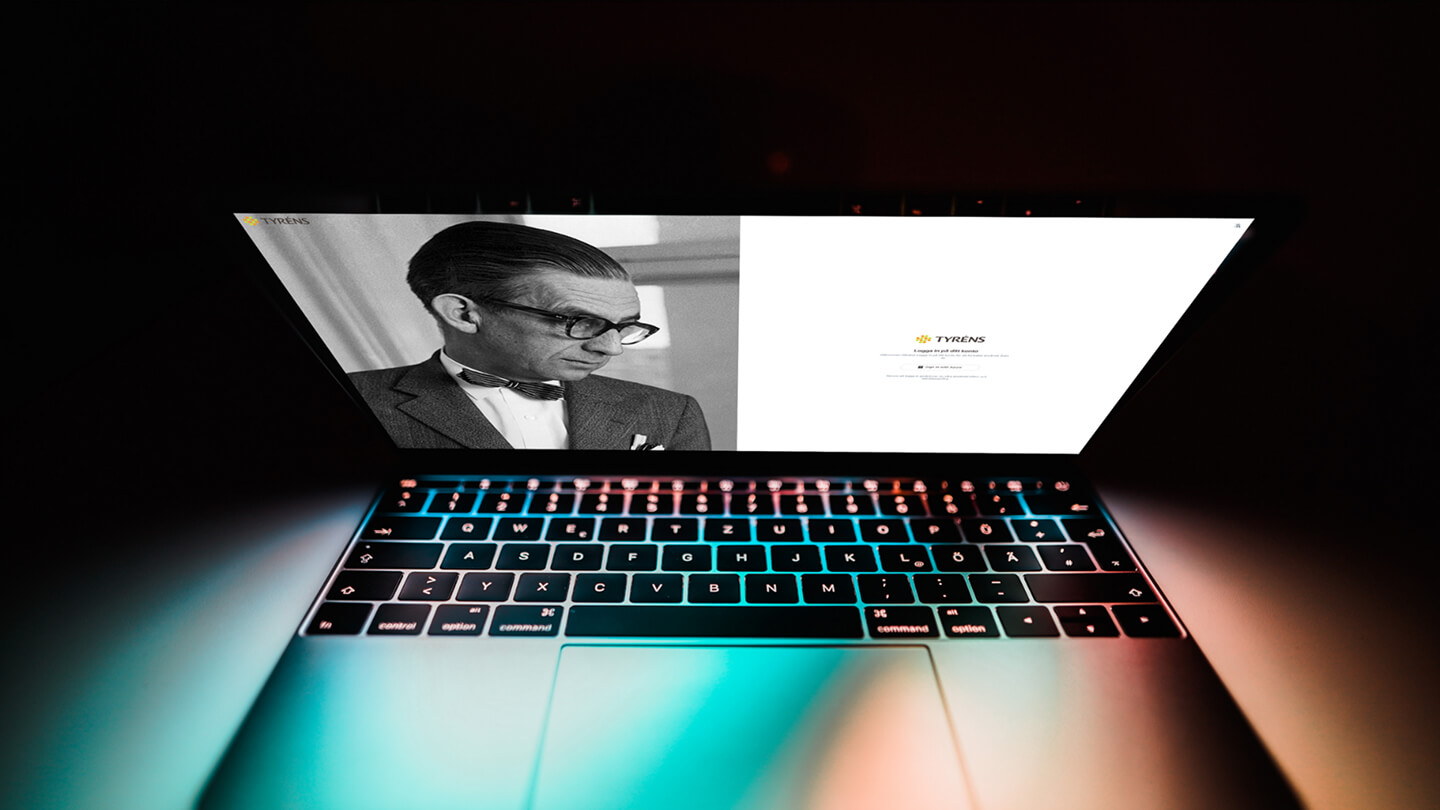 Laptop displaying SvenAI interface and developer portrait – personalized AI insights for AEC industry