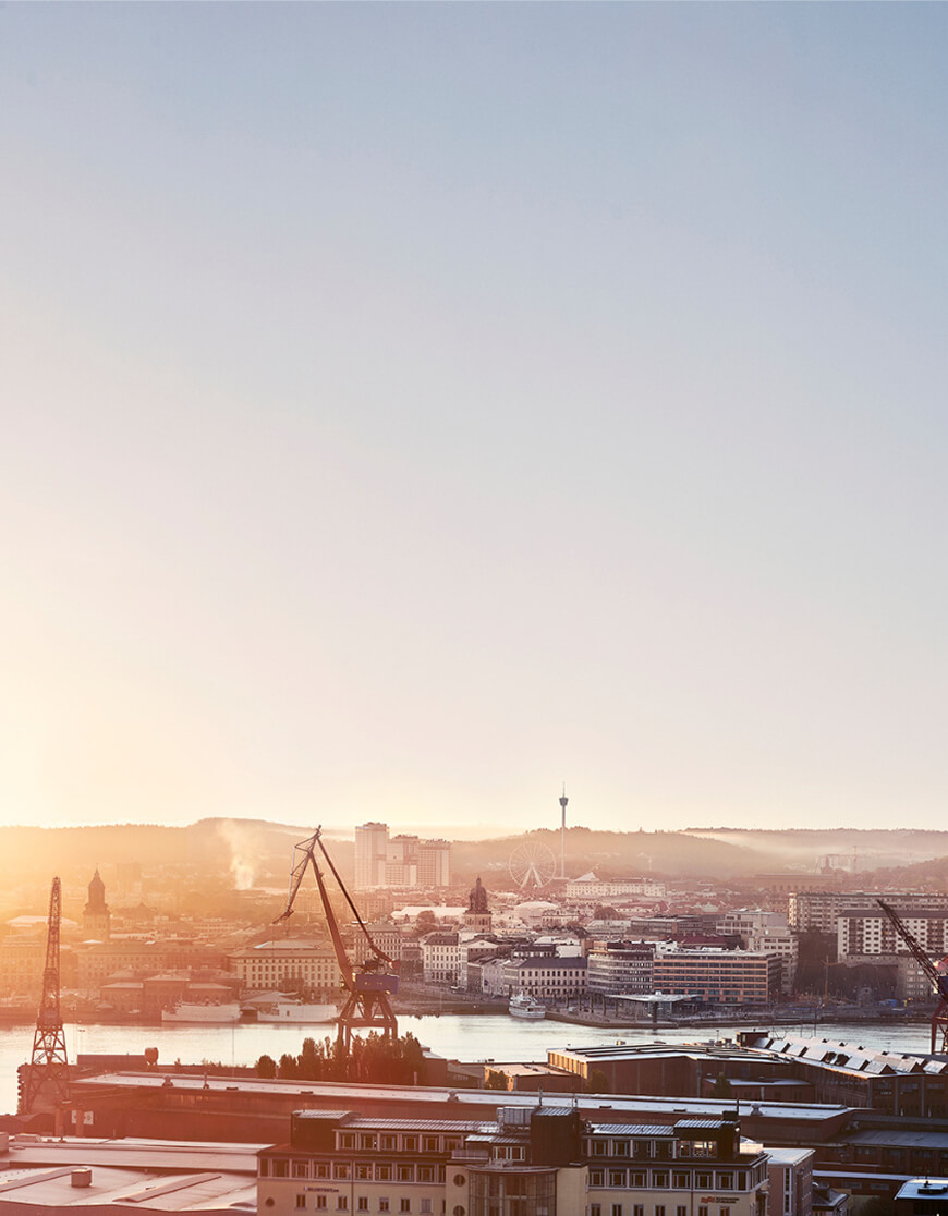 Sunrise over industrial harbor cityscape – symbolizing climate transparency with EPD Generator