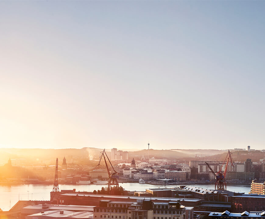 Sunrise over industrial harbor cityscape – symbolizing climate transparency with EPD Generator