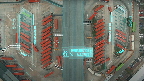 A screenshot of the video I created for the LTA, depicting futuristic graphics on a bus terminal