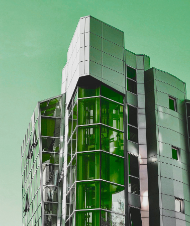 Contemporary office building representing real estate industry services