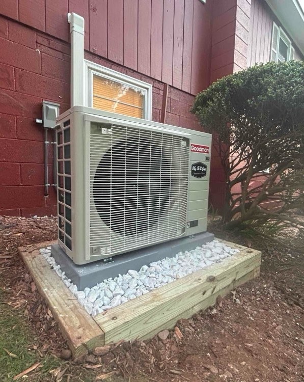 Wall-mounted ductless mini split outdoor unit.