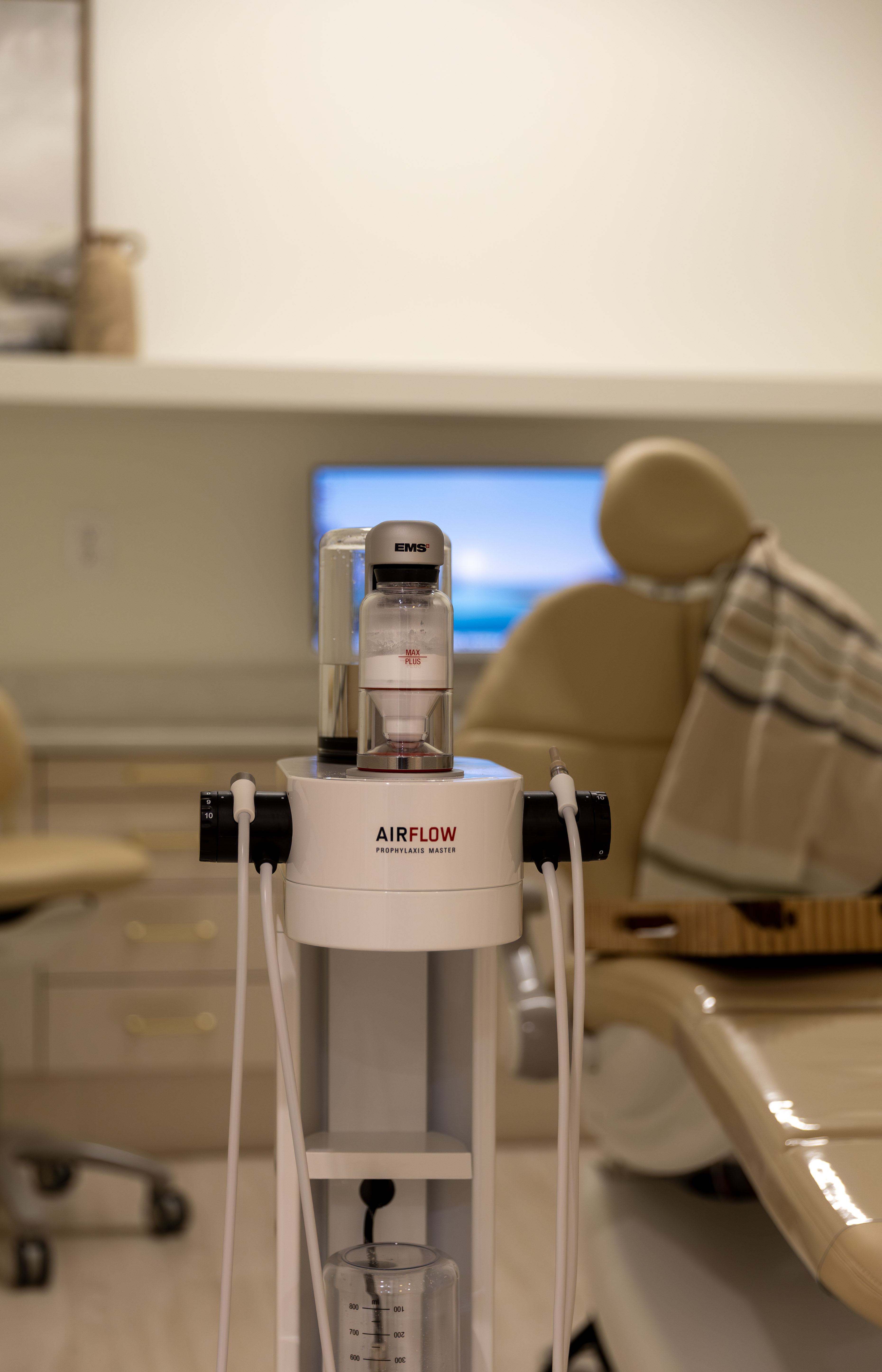 Guided Biofilm Therapy GBT cleaning with AIRFLOW device at Calm Dental Studio in Delaware, Ohio