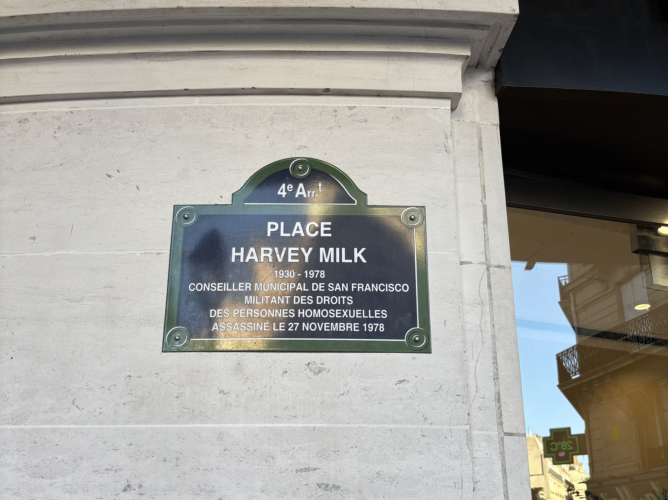 A placard on a Paris building, honouring Harvey Milk.