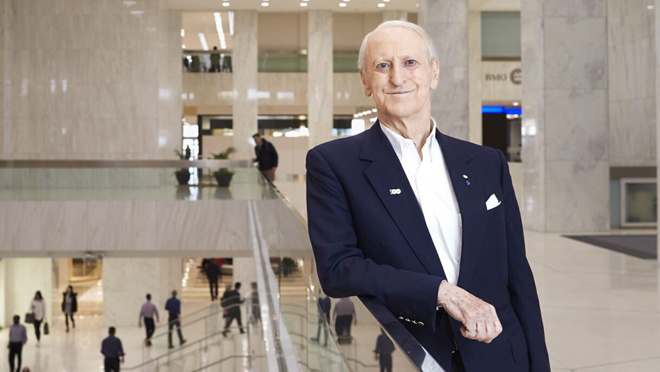 Donald K. Johnson standing at the Ivey Exchange Tower.