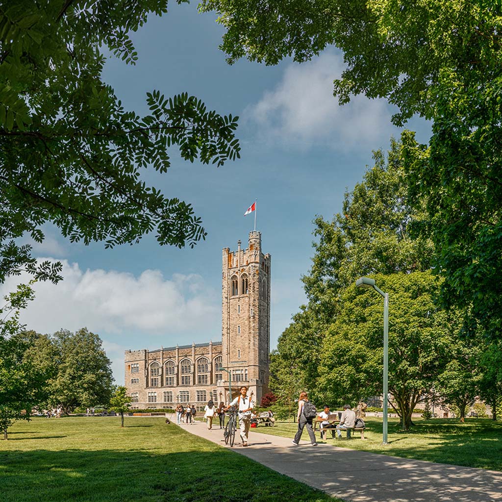 Students walking through Western University College campus.