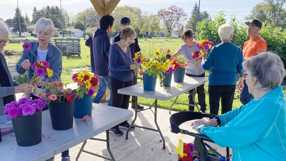Older adults arranging flowers