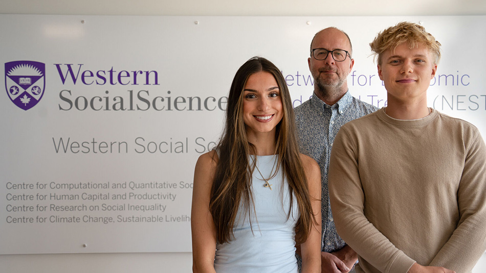USRI researchers in front of western faculty of social science