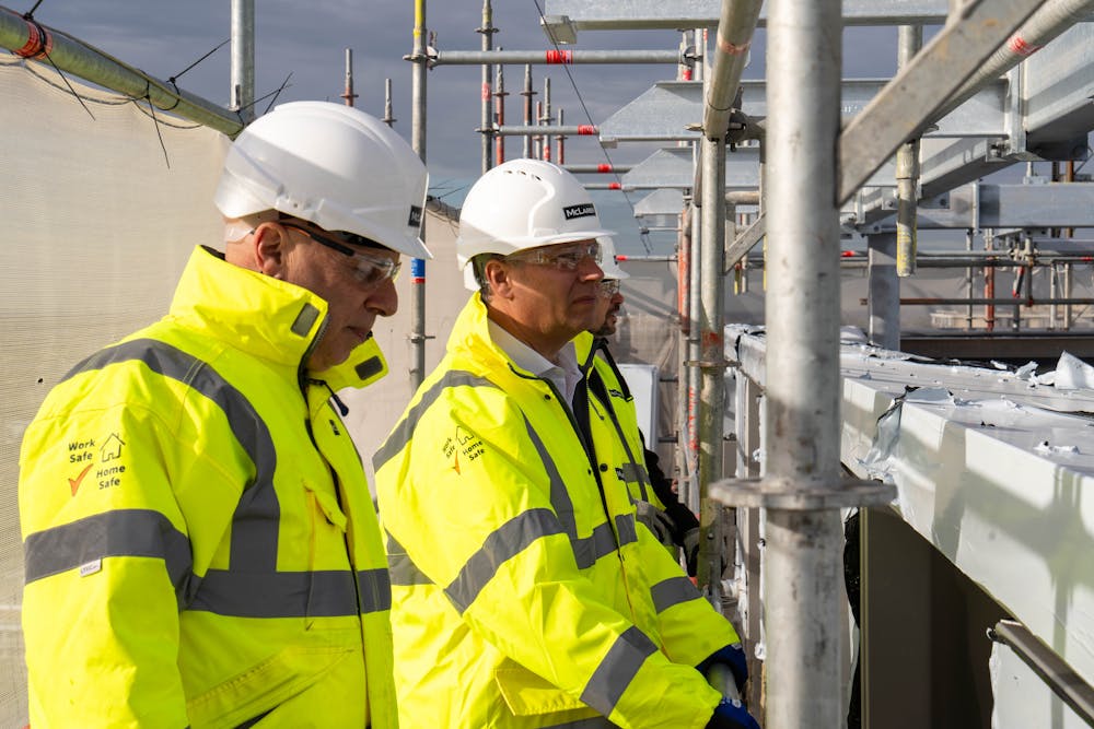Paul Heather (right) visiting McLaren's scheme at the Chalcots Estate in Camden