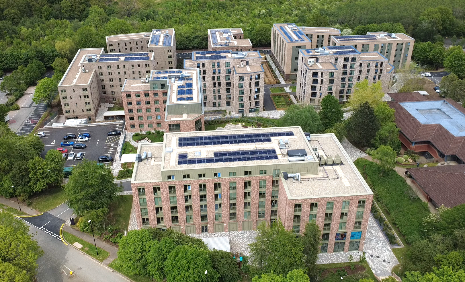 Aerial view of iQ Longwood Place student accommodation in Coventry, surrounded by woodland