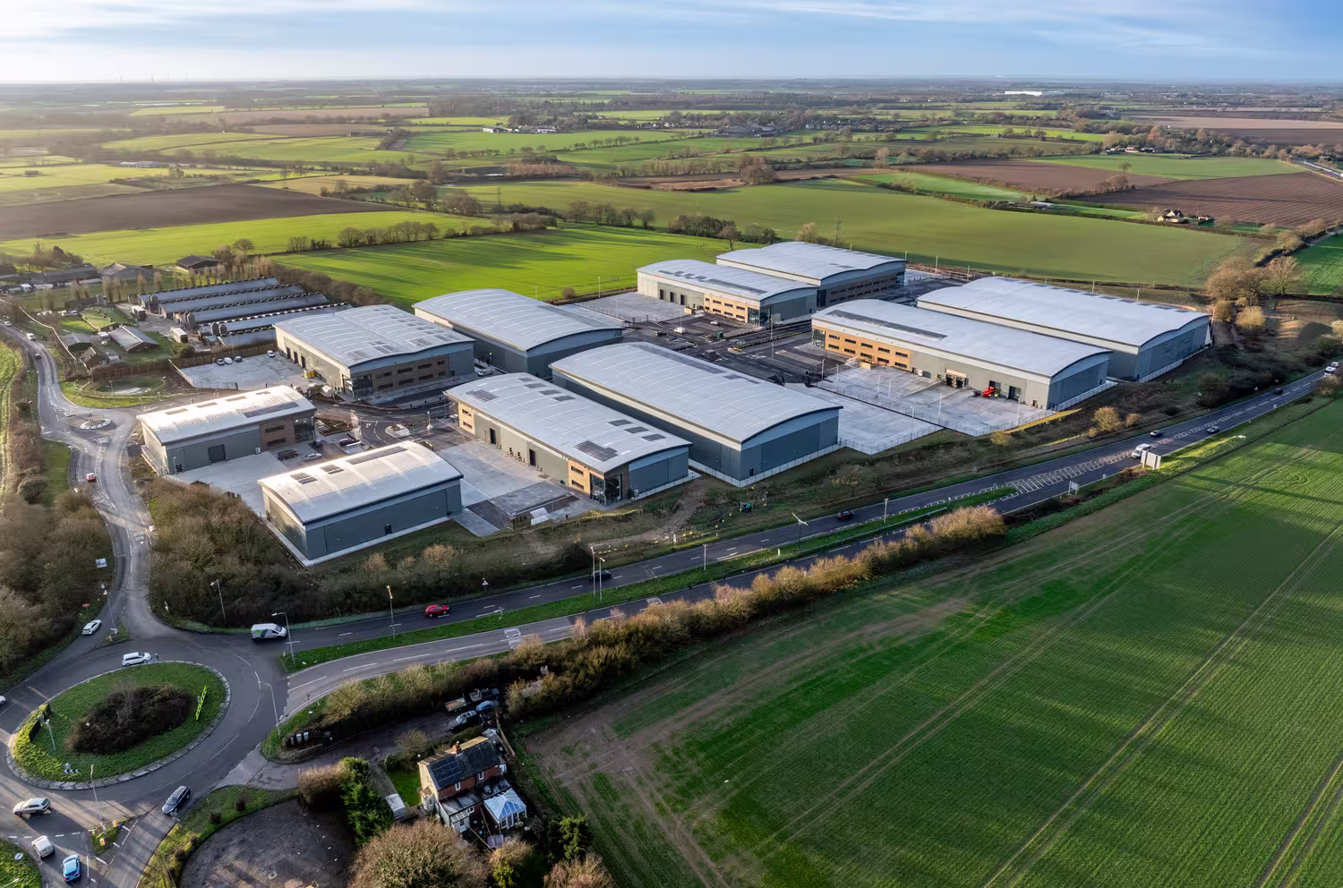 Aerial view of Centurion Park in Colchester, a cluster of industrial units surrounded by farmland