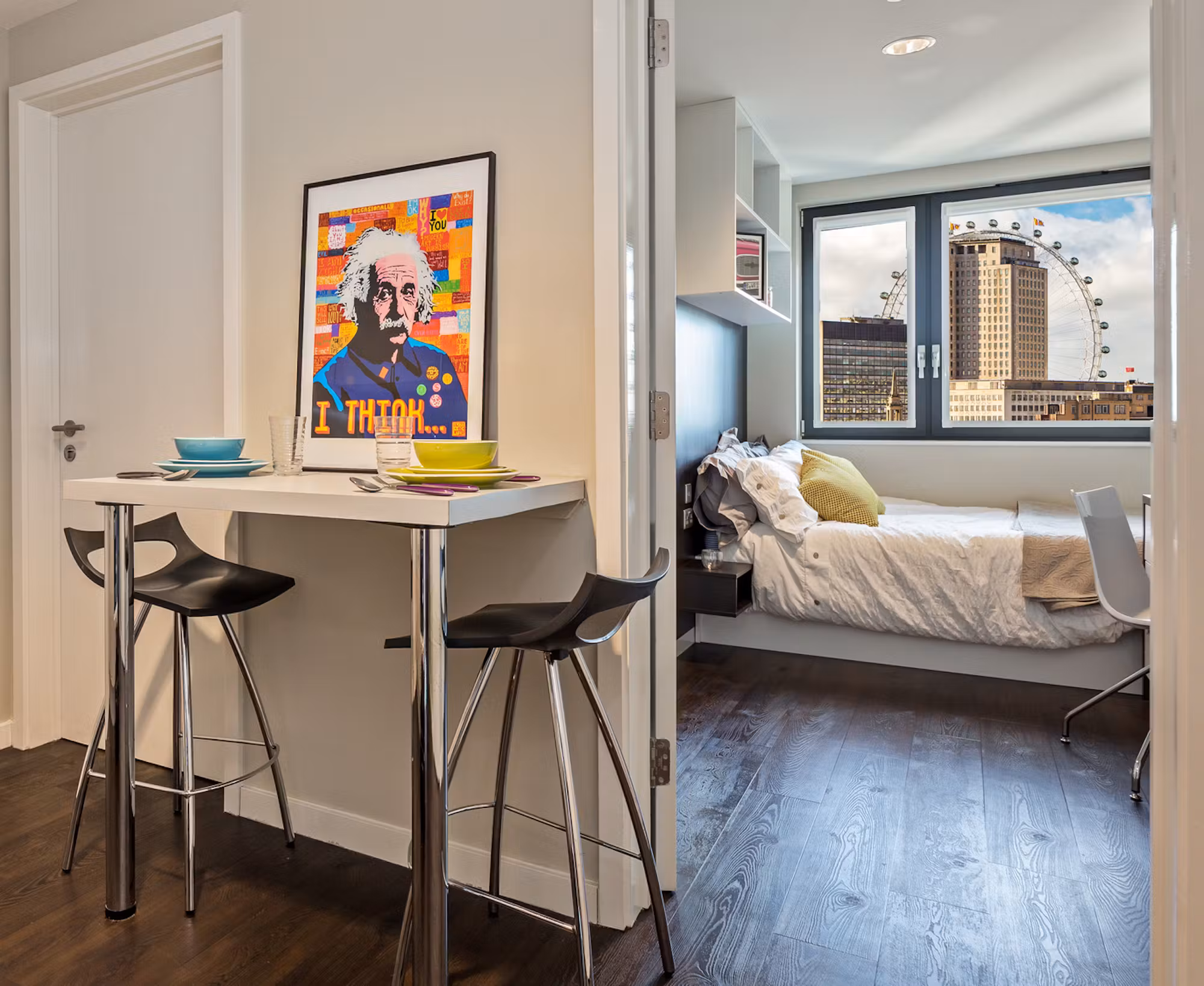 Student studio at Paris Gardens with a breakfast bar and a bedroom window overlooking the London Eye