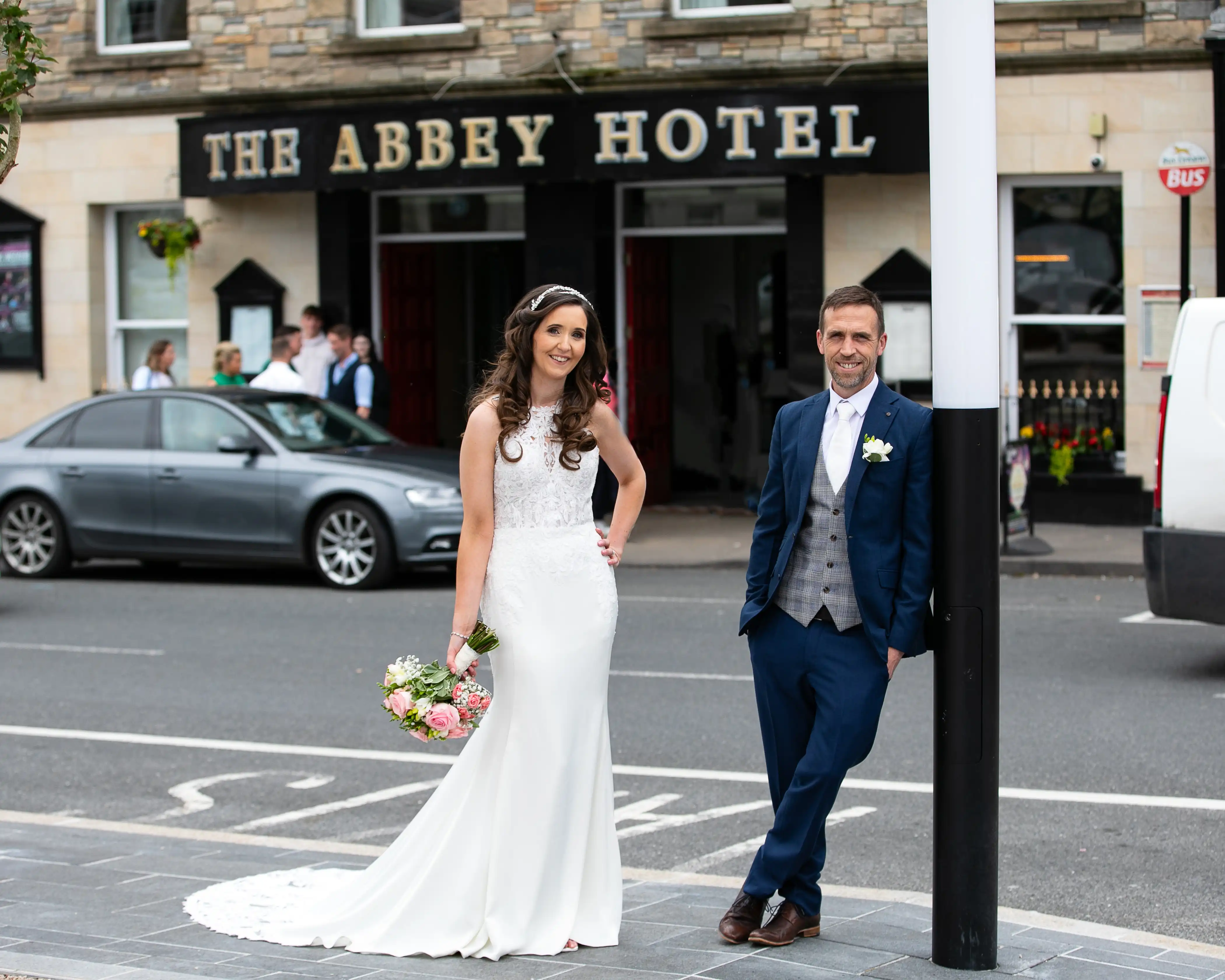Newly married couple posing for photo
