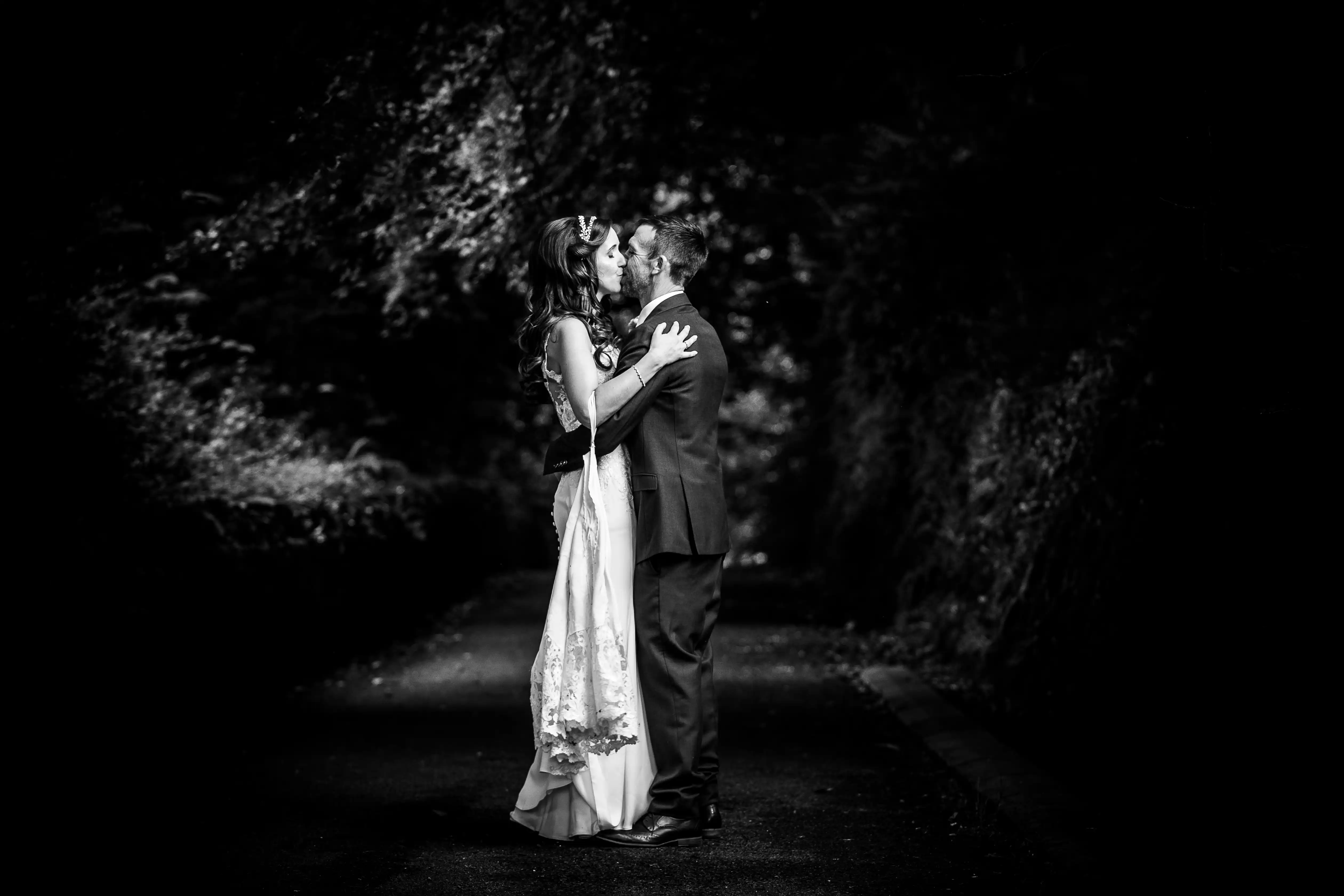 Newly married couple kissing