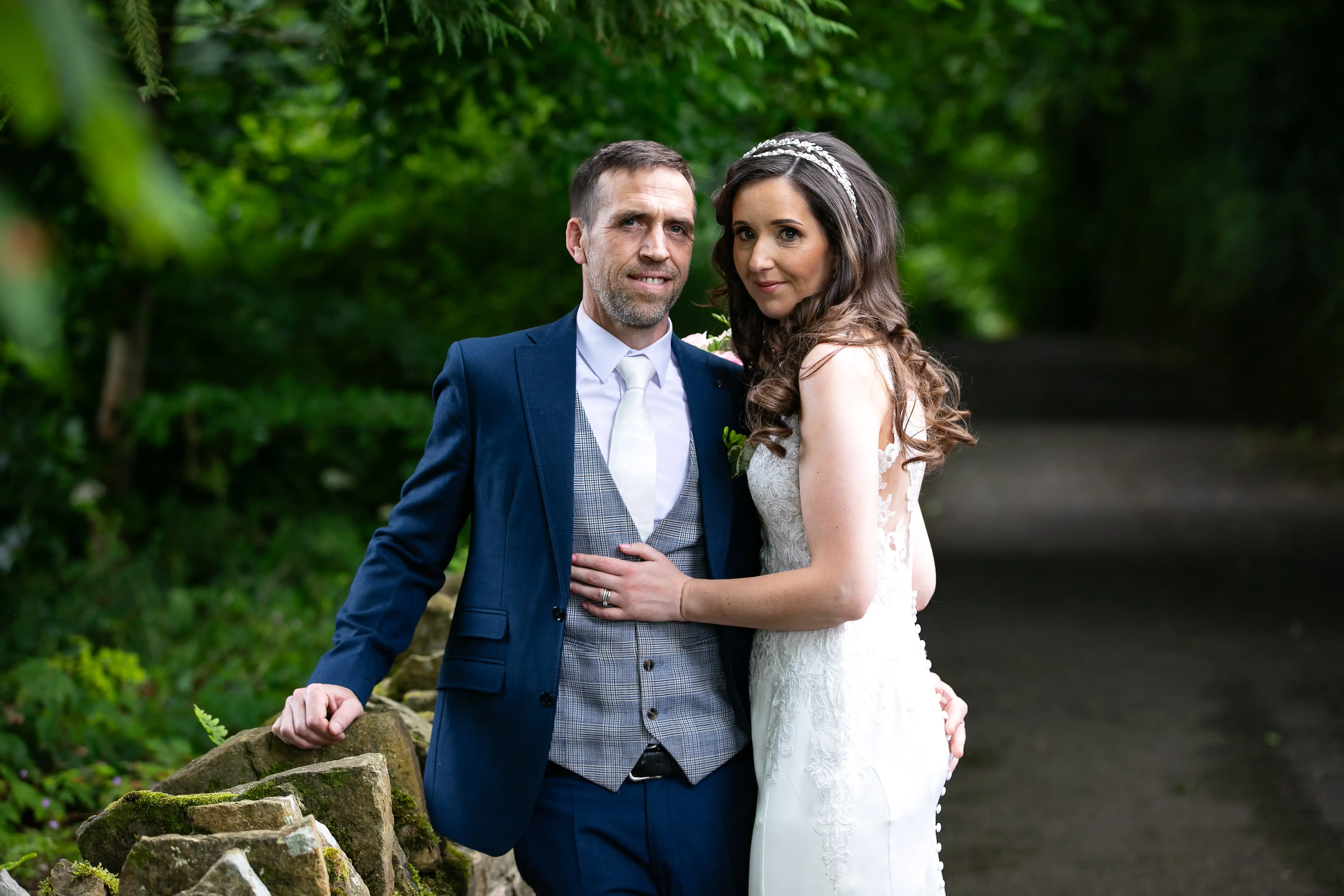 Newly married couple smiling for photo