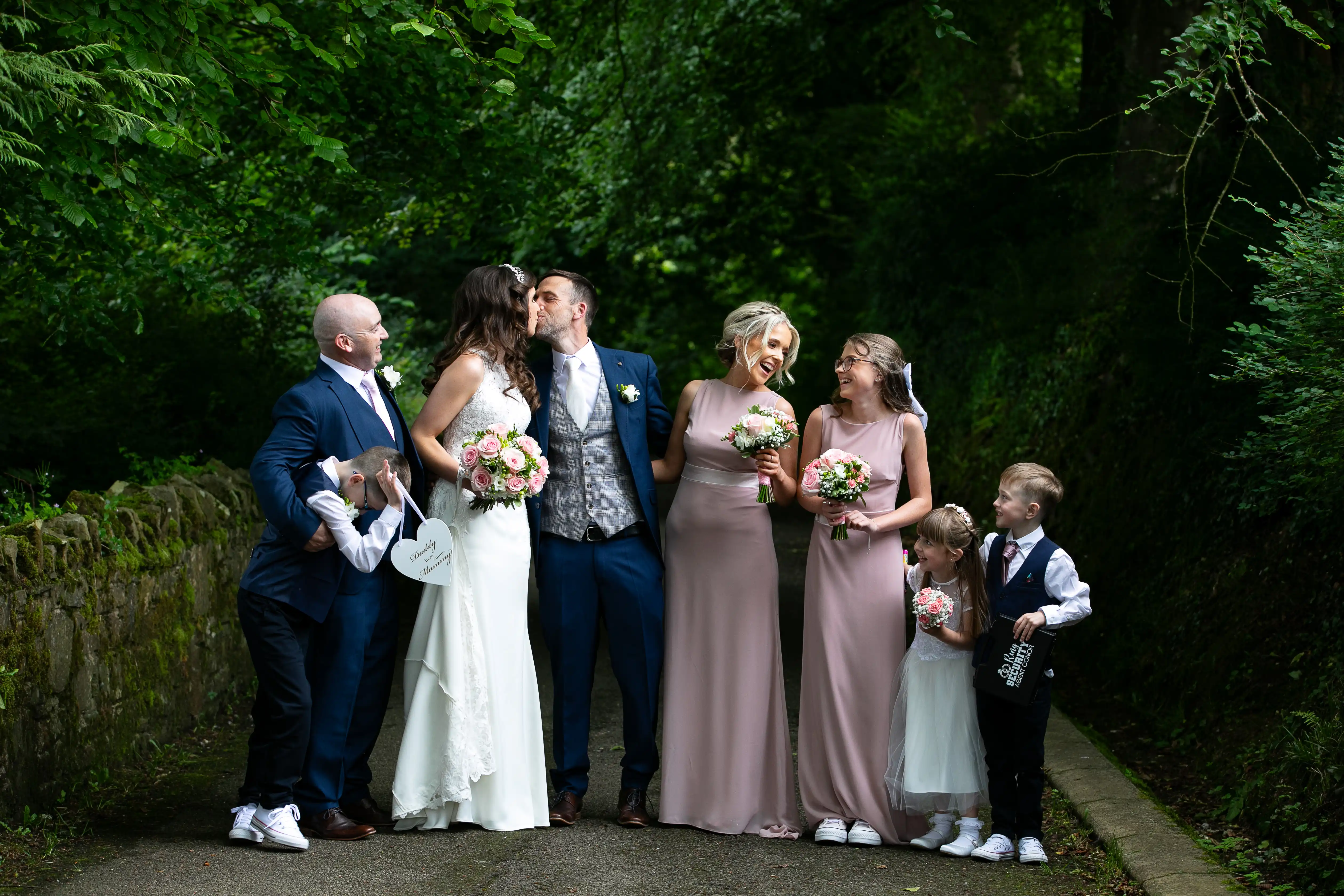Newly married couple with bridal party