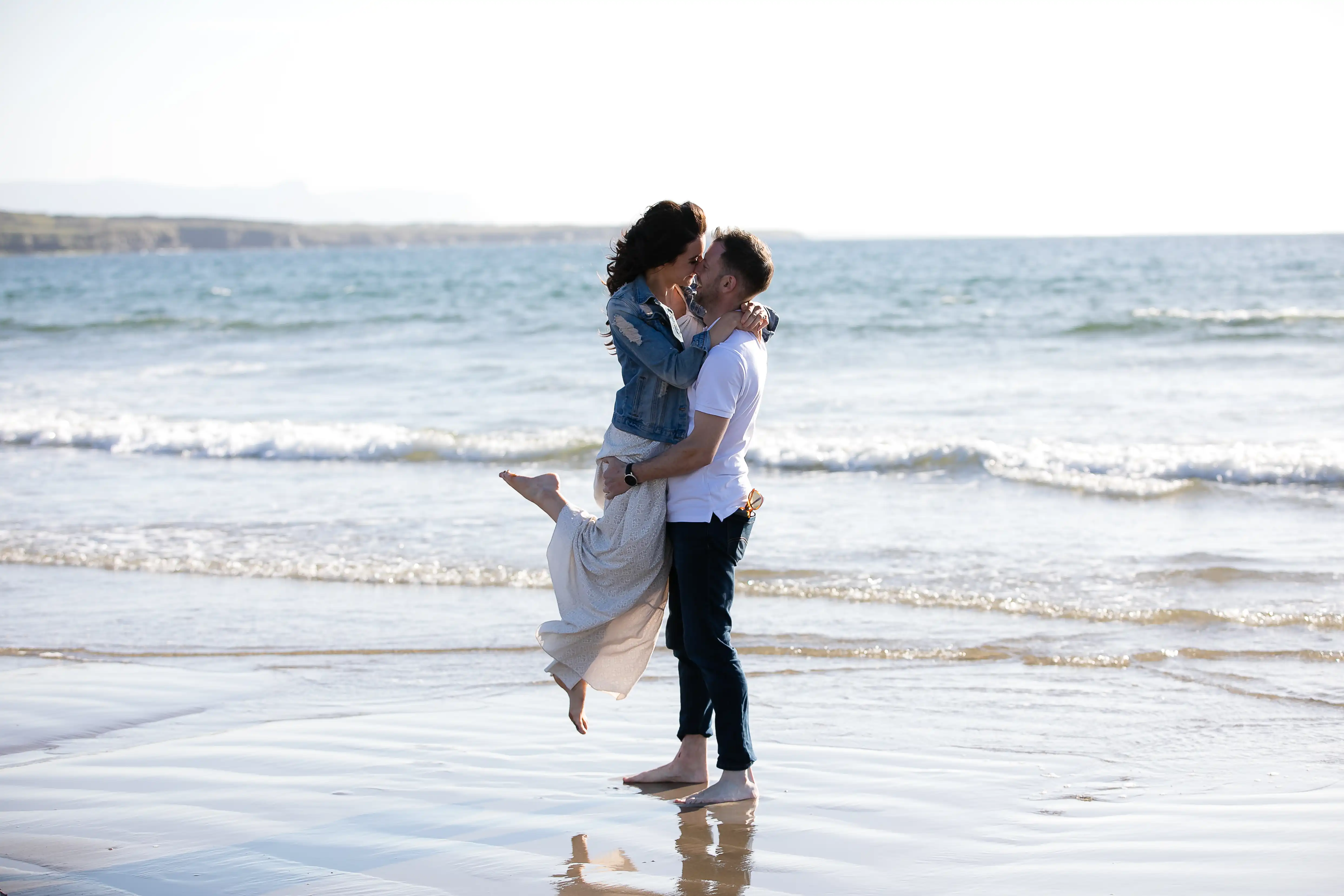 Couple kissing on beach