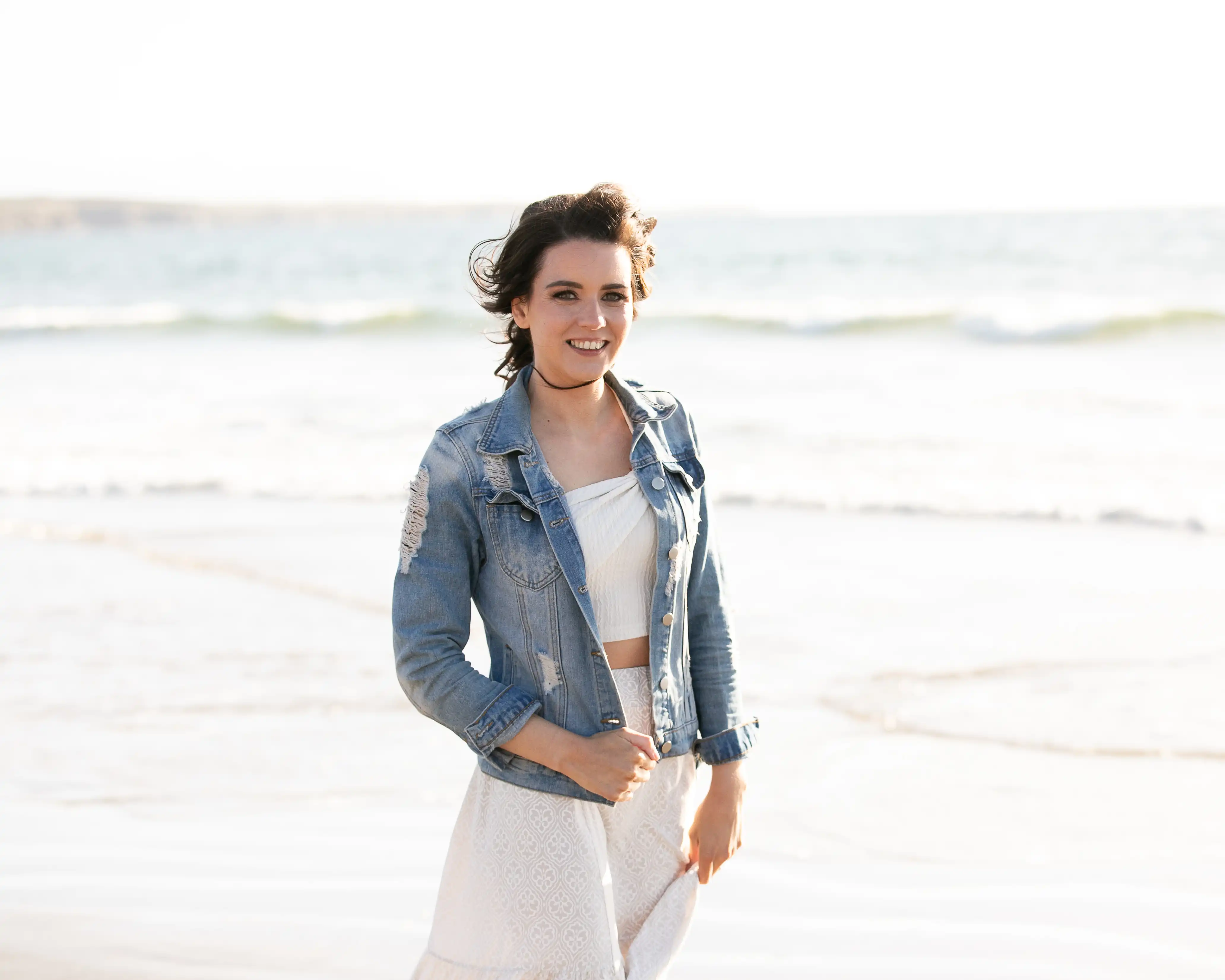 Young lady posing for photo at the beach