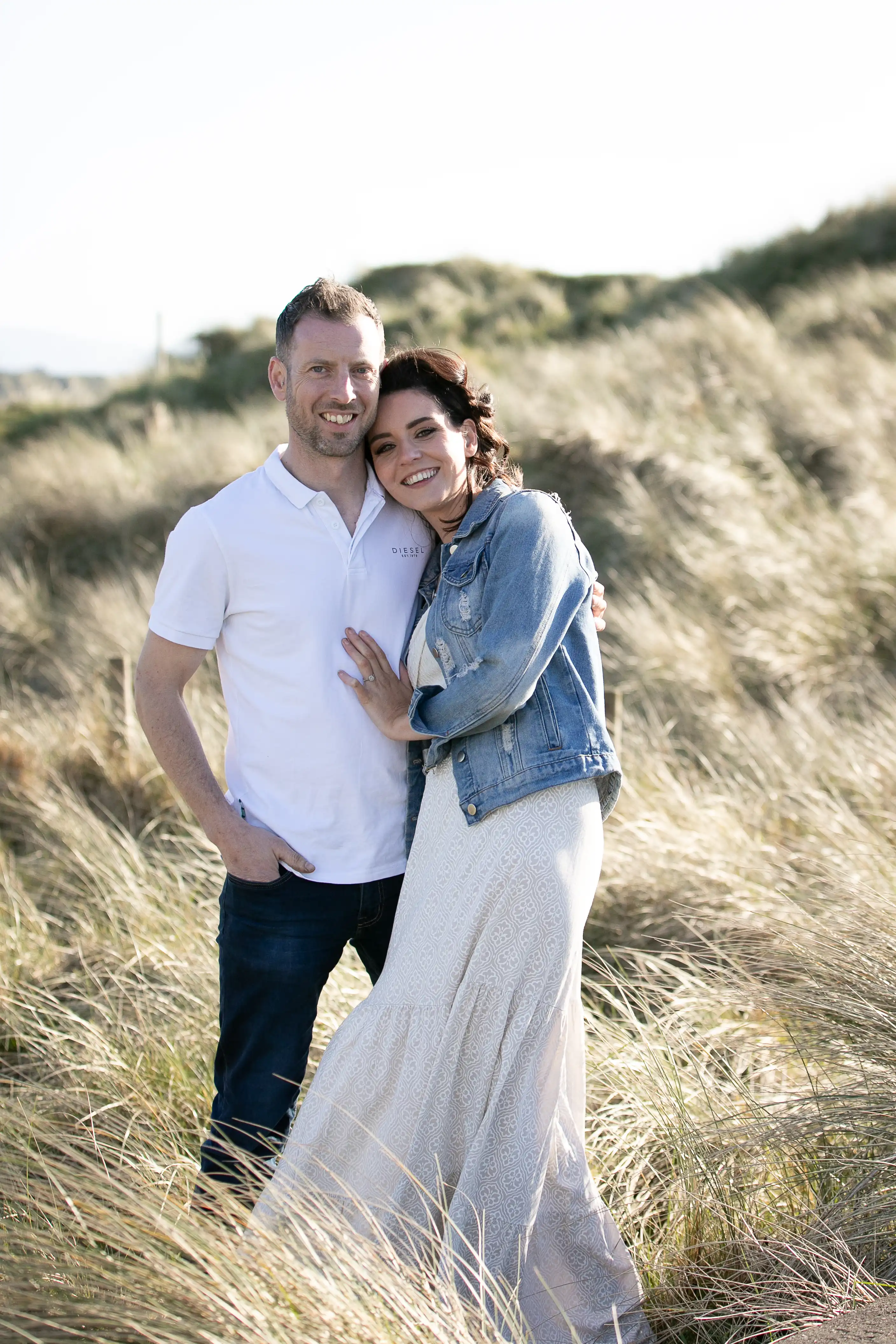 Couple smiling at the beach