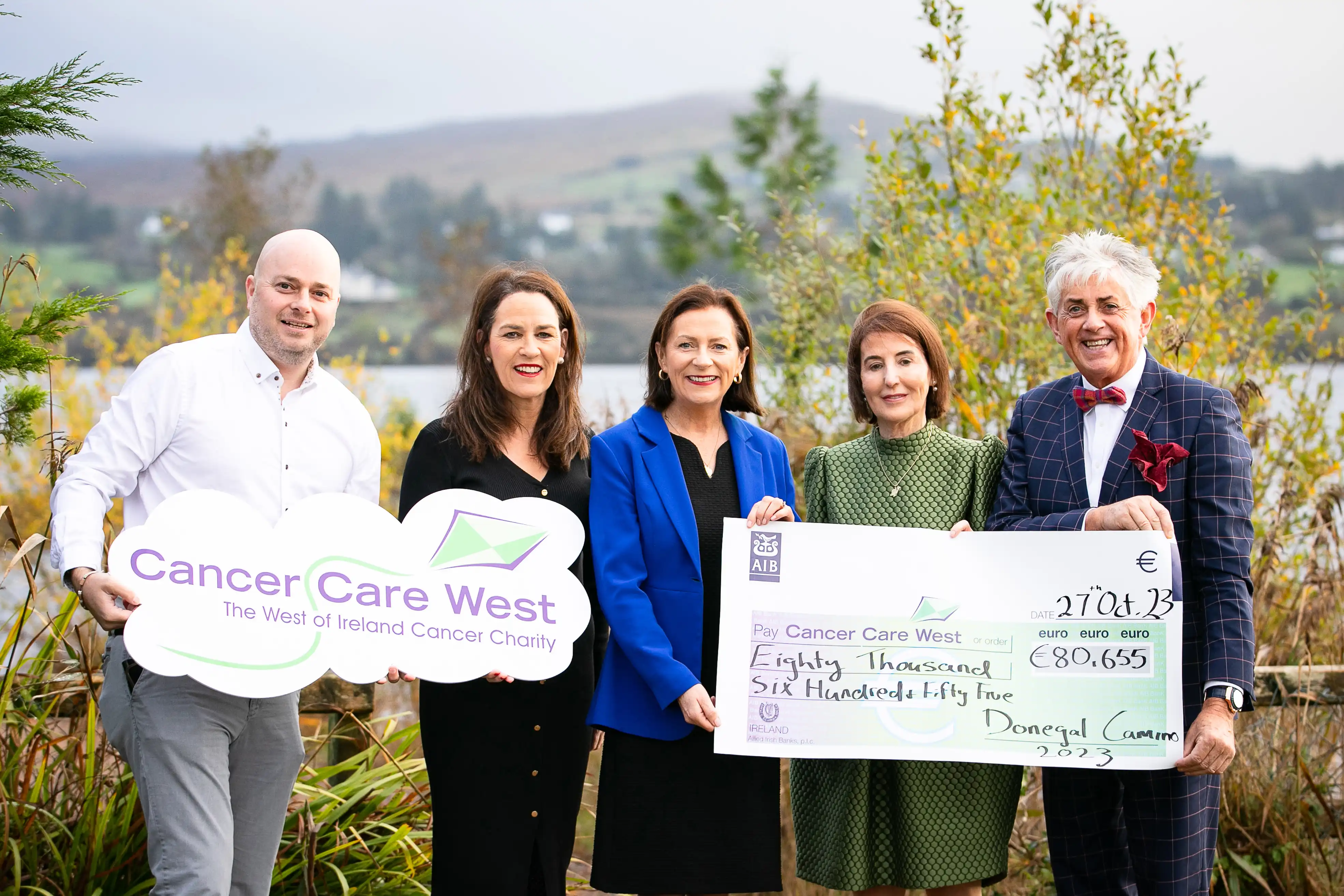 Cancer Care West team posing for photo with cheque