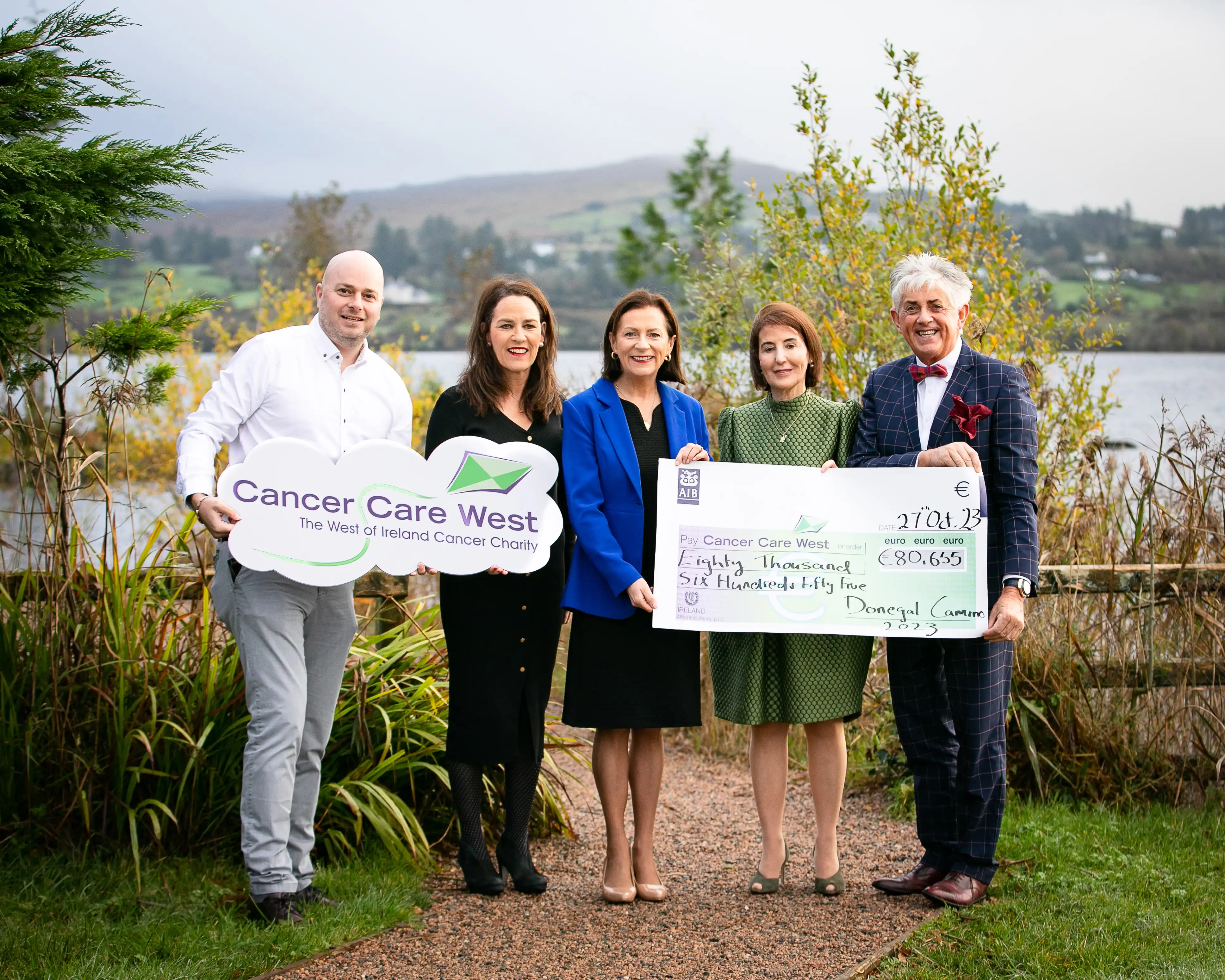 Cancer Care West team posing for photo with cheque