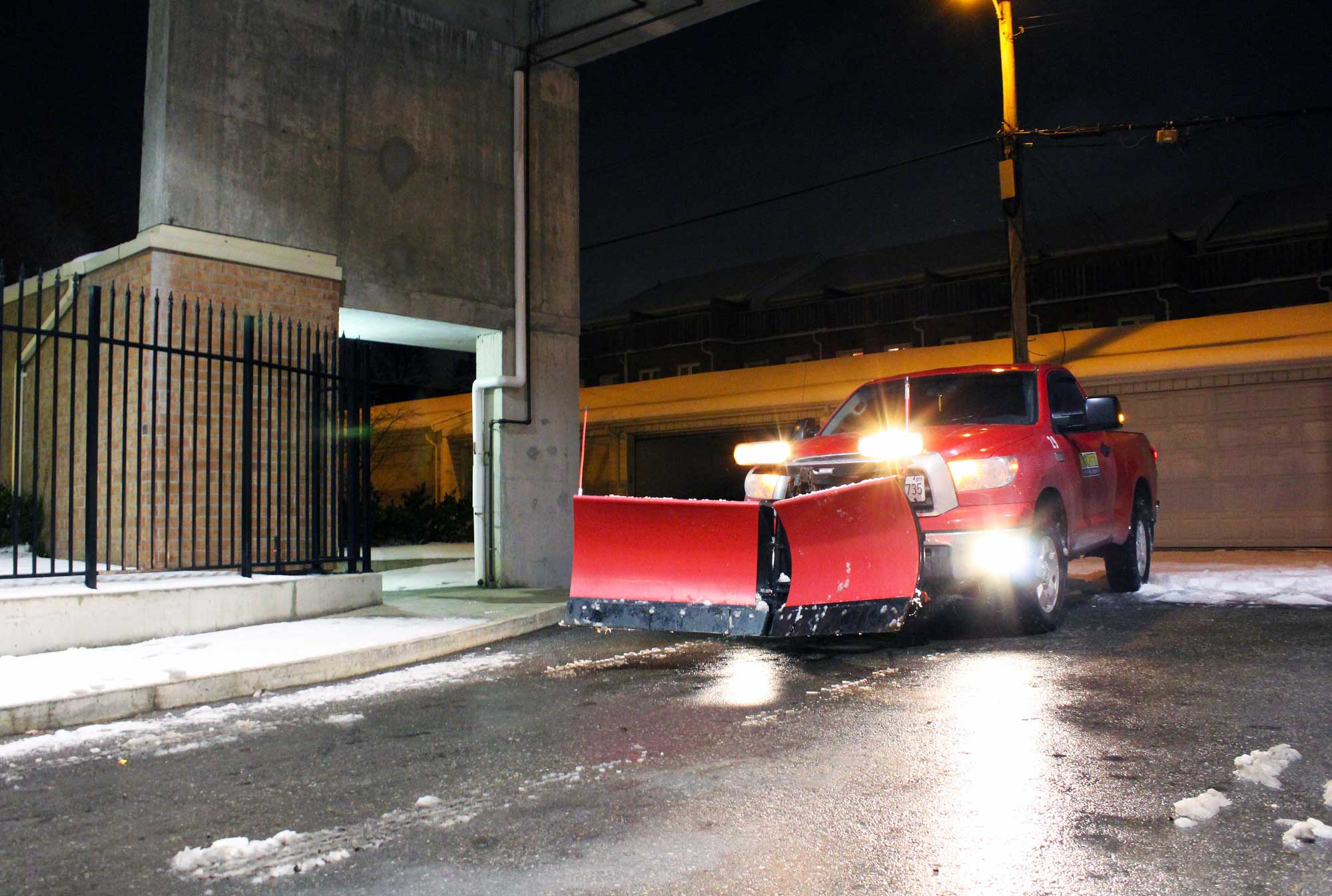 Monster Plowing Company truck removing snow, plowing snow in Toronto