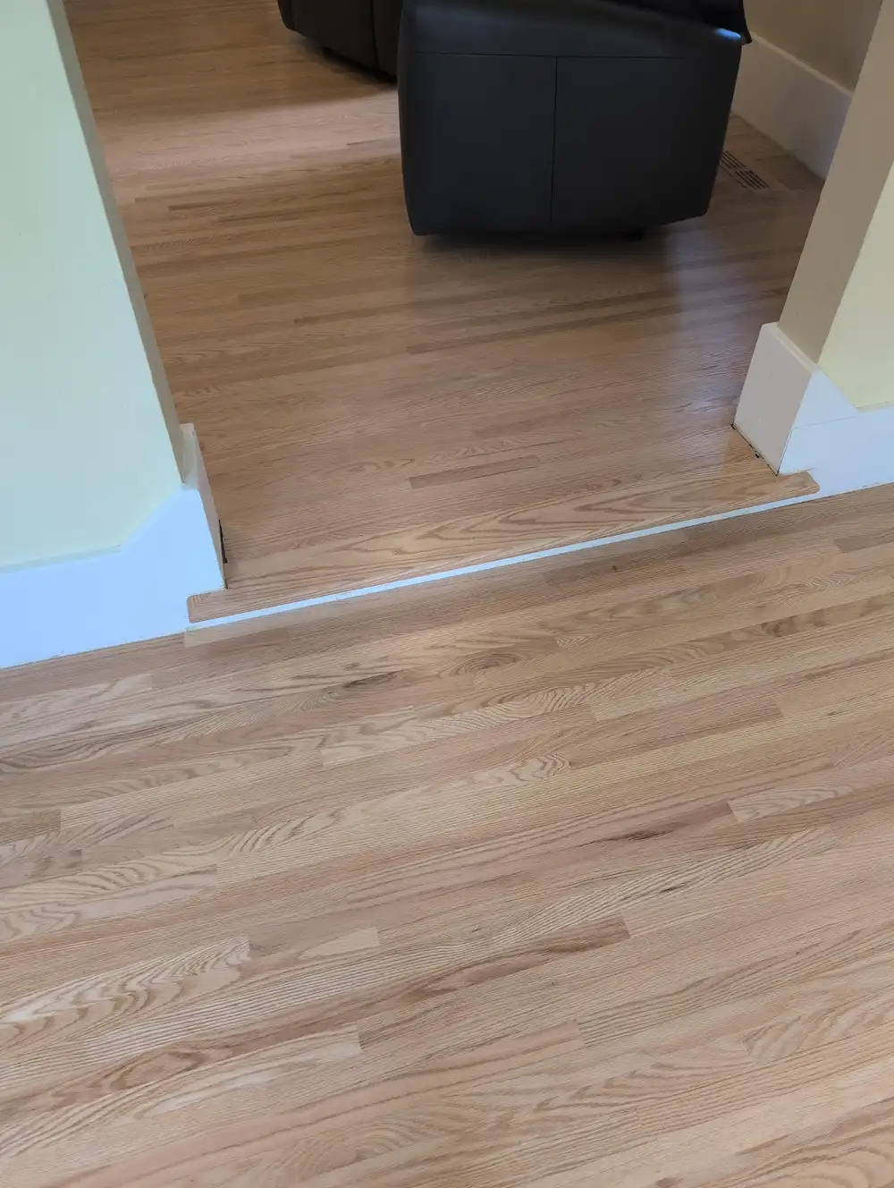 hardwood restoration by door frame