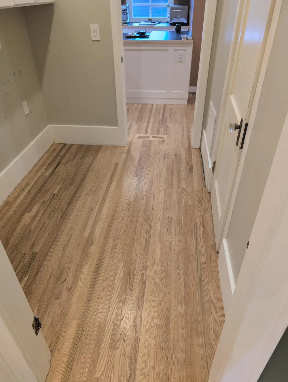 walk in closet hardwood restoration with light wood