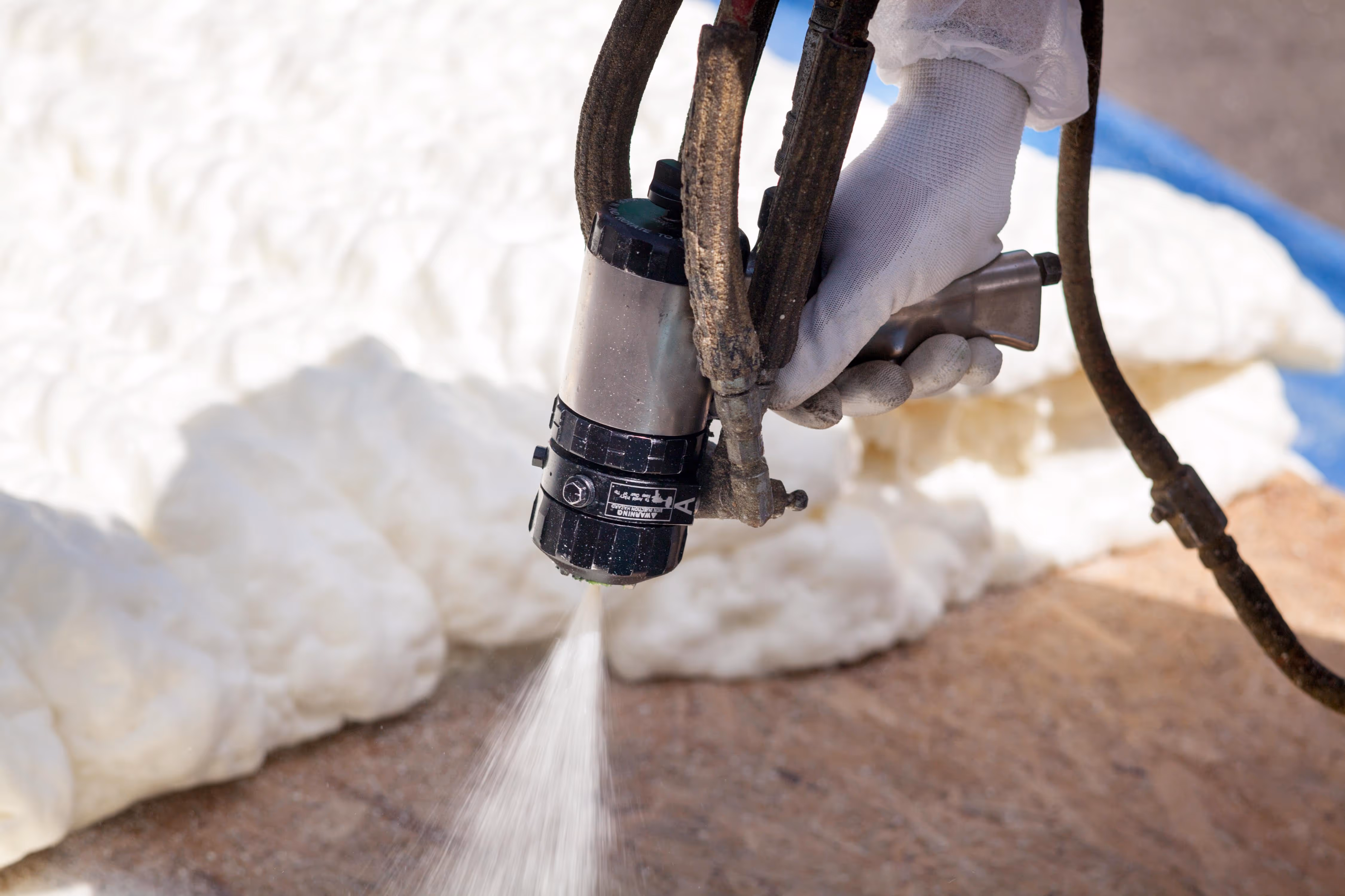 Spray foam insulation installation by a licensed professional in Illinois, Illinois.